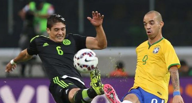 brazil_8_6__630 المنتخب البرازيلي يحقق فوزه التاسع توالياً بقيادة دونغا