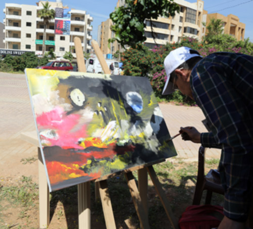 مرسم فني أمام المستشارية الثقافية الإيرانية