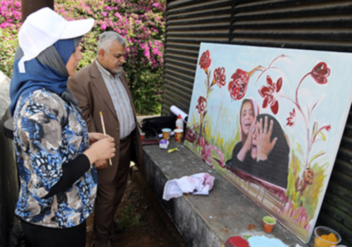 مرسم فني أمام المستشارية الثقافية الإيرانية