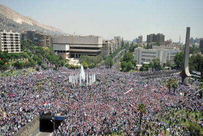 الشعب السوري يرد على المؤامرة الخارجية والملايين خرجوا الى الشارع تاييدا لخطاب الرئيس ا لاسد
