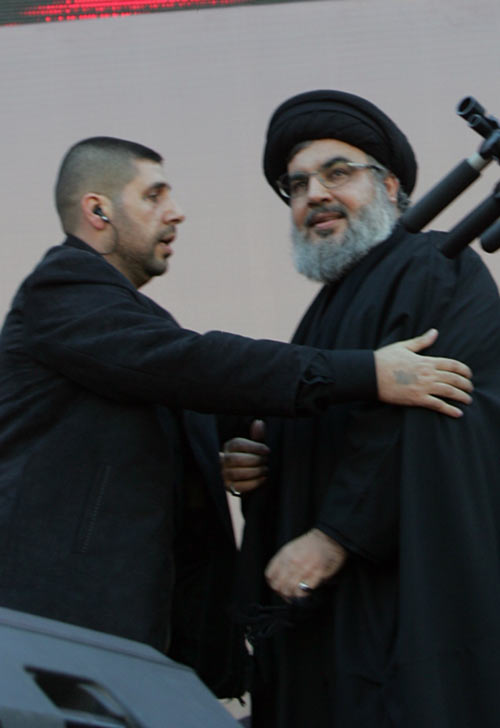 صورالسيد نصر الله في مسيرة العاشر من المحرم