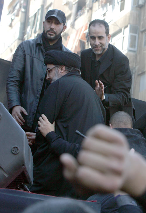 صورالسيد نصر الله في مسيرة العاشر من المحرم