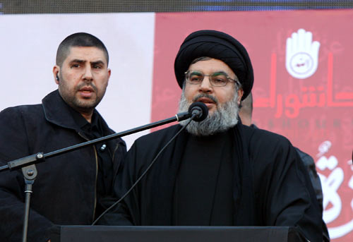 صورالسيد نصر الله في مسيرة العاشر من المحرم