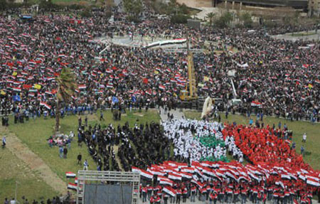 ملايين السوريين يشاركون في "المسيرة العالمية من أجل سوريا" دعماً للإصلاح ورفضاً للتدخل الخارجي