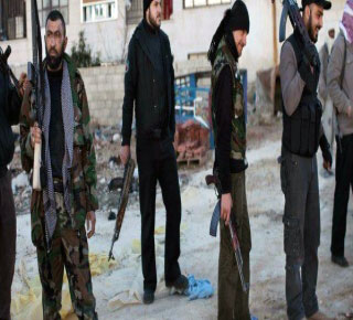 "التايمز": واشنطن تساعد في نقل أسلحة قطرية وسعودية للمعارضة السورية