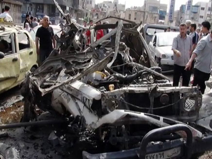 تفجيرا دمشق تزامنا مع مؤتمر للمعارضة الداخلية ولم يستهدفا مبنى الاذاعة والتلفزيون والاضرار اقتصرت على الماديات