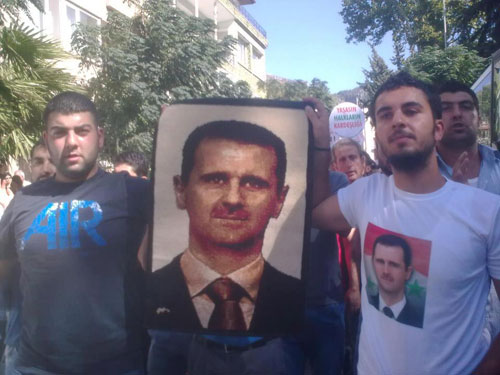 خاص "الانتقاد" : "لا للحرب" مطلب الاتراك فى "يوم السلام العالمي" وصور الاسد ترتفع في اسطنبول