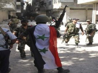 سوريا: اشتباكات عنيفة في محيط مطار تفتناز ومنع "انتحاري" من تفجير نفسه في حماة