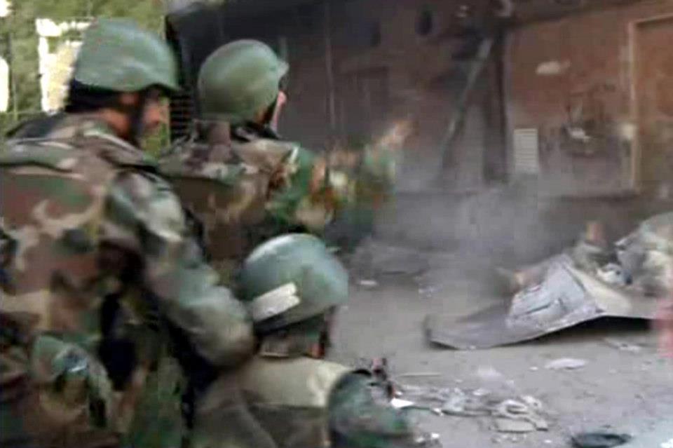 "القيادة العامة" تنفي سيطرة "الجيش الحر" على مخيم اليرموك