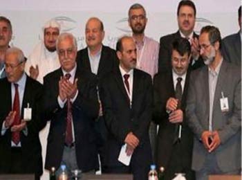 معاذ الخطيب ورياض سيف يقرران حضور مؤتمر روما 