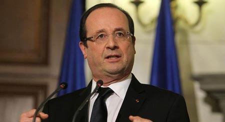 هولاند يأمل بحل "سياسي" في سوريا