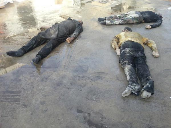 العثور على أسلحة ونفق في ريف دمشق وقتلى من المسلحين في حمص