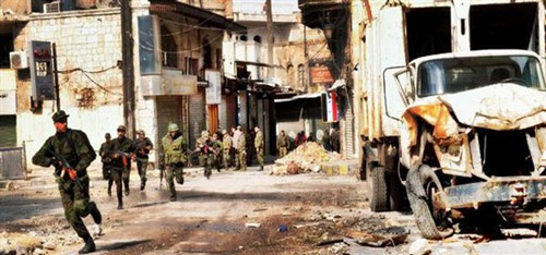 مئات المسلحين استسلموا للجيش السوري في مدينة القصير 