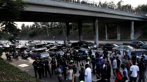 وزارة العدل الأمريكية تنظر في فتح تحقيق جديد في مقتل مواطن أسود 