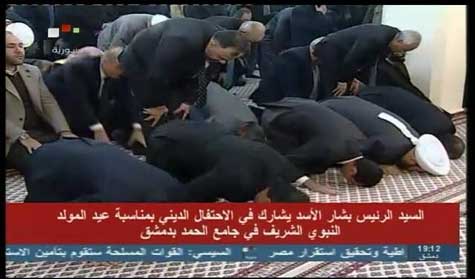 الأسد يشارك في إحياء المولد النبوي في دمشق