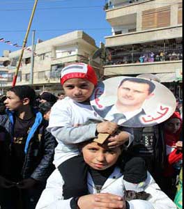 بالصور: تظاهرة مؤيدة للقيادة السورية في منطقة السيدة زينب (ع)