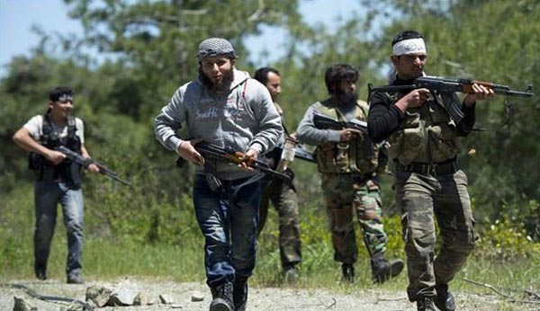 من هو الأب الروحي للمسلحين الأجانب في سوريا !