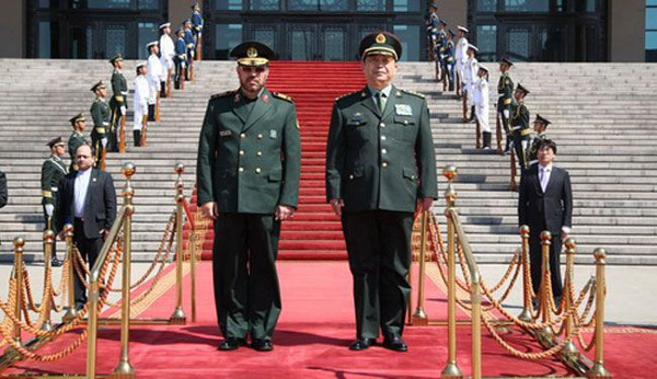 تأكيد إيراني صيني على تعزيز التعاون الدفاعي
