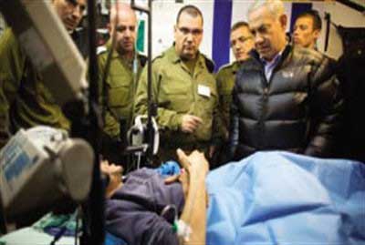 اتفاق بين الاحتلال والإرهابيين على تبادل المعلومات الأمنية مقابل الأسلحة والعلاج