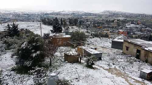  لبنان مكلل بالأبيض