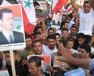 مسيرة دعم للرئيس الاسد في الزهراني 
