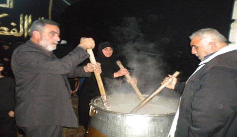 النبطية وجوارها تواسي الامام الحسين(ع) بموائد عاشورائية 

