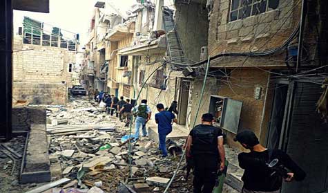  مسلحو سوريا.. يقتتلون في الرقة ويستسلمون في برزة