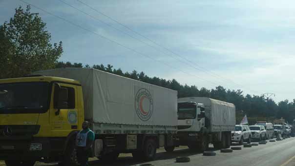 دخول شاحنات مساعدات إلى منطقة الزبداني في ريف دمشق ومدينتي الفوعة وكفريا بريف إدلب برعاية الامم المتحدة  