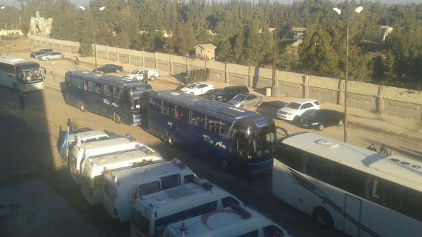 بدء خروج الدفعة الأولى من المسلحين من حي الوعر في حمص