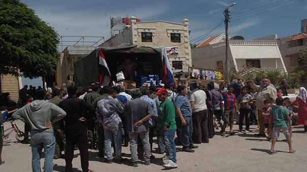 توزيع مساعدات انسانية روسية في مدينة الرحيبة بريف دمشق 