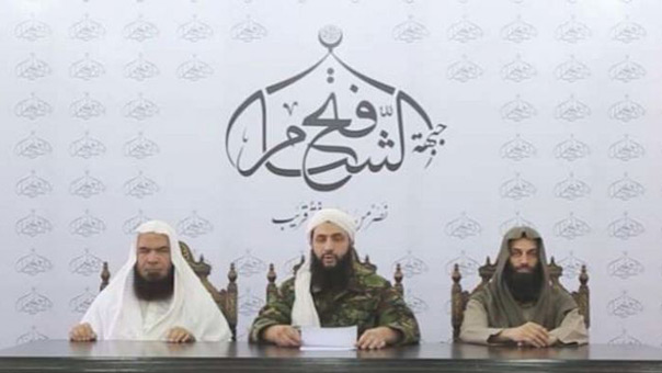 من هما الشخصان اللذان ظهرا برفقة الجولاني؟