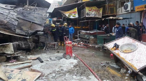 أكثر من 20 شهيدا وعشرات الجرحى بتفجيرين في منطقة السنك وسط بغداد