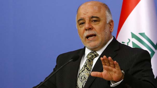 العبادي: اليد التي تمتد على الحشد الشعبي ستقطع