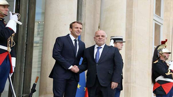 العبادي من فرنسا: الحويجة حررت بالكامل..وماكرون يعلن استعداد بلاده للتوسط بين بغداد وأربيل