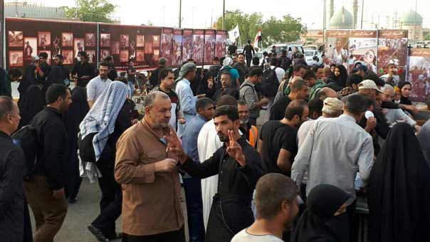 بالصور..ناشطون يمنيون يقيمون عدة معارض صور في العراق لفضح جرائم العدوان السعودي بالتزامن مع اربعينة الأمام الحسين(ع)