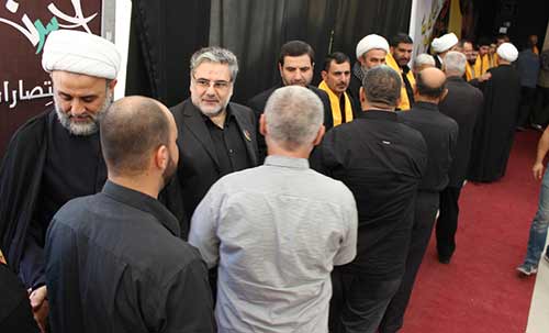 حزب الله يتلقى التبريكات بالشهيد القائد حسن الحاج في مجمع الامام الحسين(ع) في صور