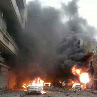 استشهاد 10 مدنيين وإصابة العشرات في انفجار إرهابي في حمص