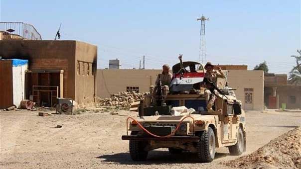 تحرير هيت بالأنبار والعلم العراقي يرفرف فوقها