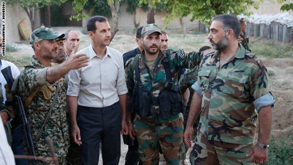 بالصور: الرئيس السوري بشار الاسد يشارك جنوده وجبة الافطار على الحدود الأمامية في منطقة الغوطة الشرقية بريف دمشق