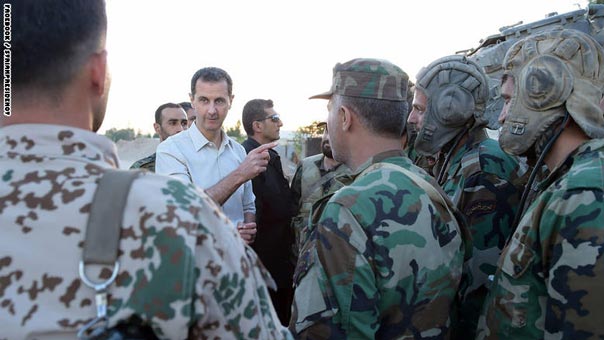 بالصور: الرئيس السوري بشار الاسد يشارك جنوده وجبة الافطار على الحدود الأمامية في منطقة الغوطة الشرقية بريف دمشق