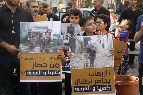 احتفال تضامني مع اهالي كفريا والفوعا ونبل والزهراء قرب مجمع القائم (ع): لضرورة اقتلاع الارهاب وانقاذ الاطفال