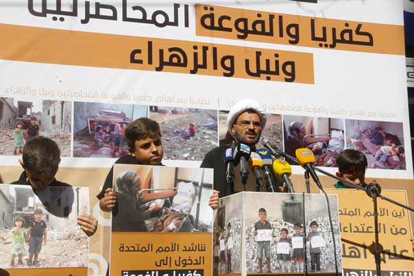 احتفال تضامني مع اهالي كفريا والفوعا ونبل والزهراء قرب مجمع القائم (ع): لضرورة اقتلاع الارهاب وانقاذ الاطفال