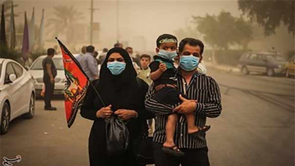 بالصور: عاصفة ترابية تضرب النجف الأشرف بالتزامن مع أربعينية الإمام الحسين(ع)