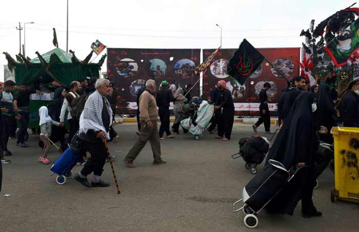 بالصور..ناشطون يمنيون يقيمون عدة معارض صور في العراق لفضح جرائم العدوان السعودي بالتزامن مع اربعينة الأمام الحسين(ع)