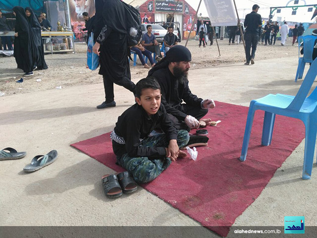 بالصور.. العهد يرافق &rsquo;المشاية&rsquo; على الطريق نحو كربلاء المقدسة