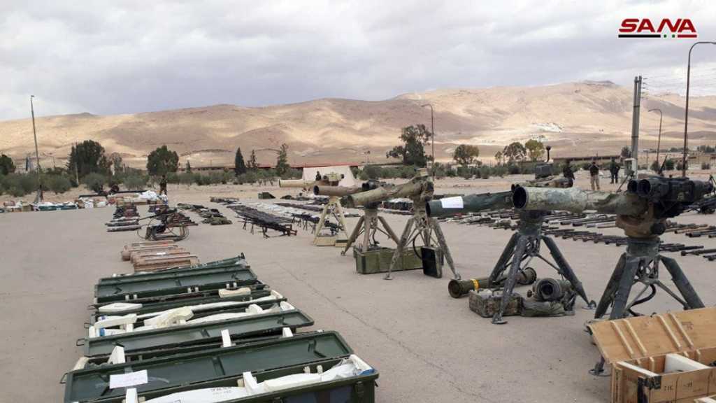 بالصور: إرهابيو القلمون الشرقي يسلمون أسلحتهم الثقيلة والمتوسطة