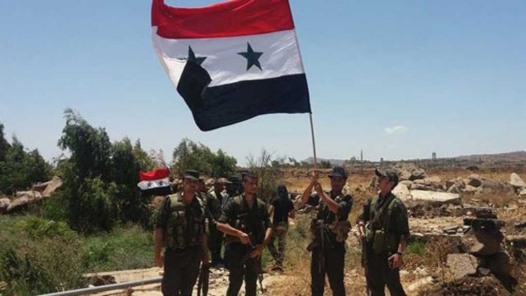 رفع العلم السوري على معبر القنيطرة على الشريط الفاصل مع الجولان المحتل